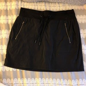 Athleta black skort with zipper pockets